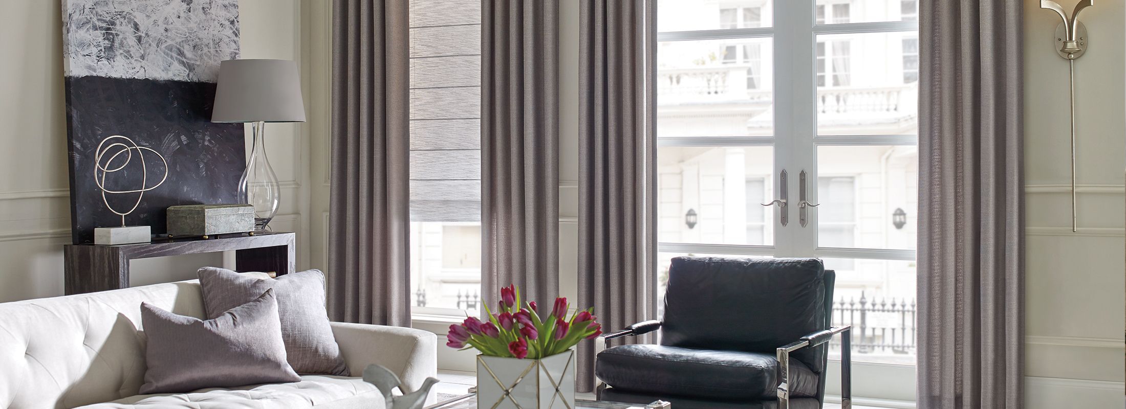 Gray curtains and drapes in a modern living room, 2026 custom drapery trend.