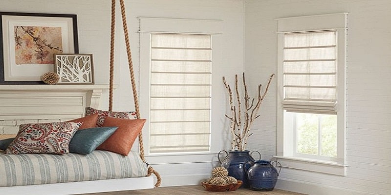 Roman shades on windows in a Bellingham, WA living room, showcasing safe and stylish window coverings with cordless design for family-friendly homes.